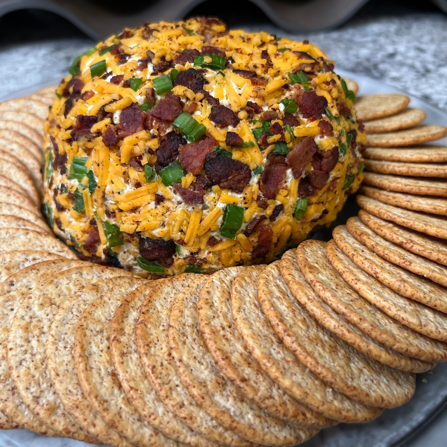 A cheeseball is one of the simplest, tastiest, and easiest things that you can make for a party, or any gathering of friends and family coming together. This recipe is the perfect example of ingredients coming together to form a truly delicious cheeseball – it’s chock full of comfort food, and comes together in no time at all, with barely any effort whatsoever.

#foodporn #yummy #instafood #instagood #instafollow #foodies #foodiesofinstagram #homemade #homecooking #homecook #followformore #foodphotography #foodphoto #appetizers #bacon #cheese #cheeseball #pride #traderjoes